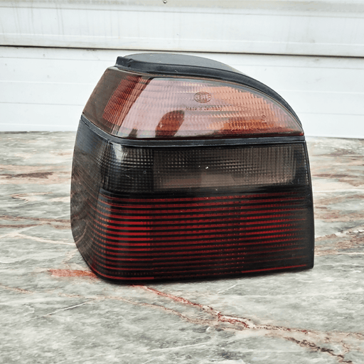 Rear light for VW Golf III Left, with lamp base - tuniparts